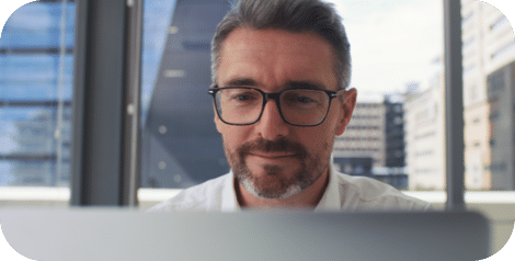 Man looking at a laptop